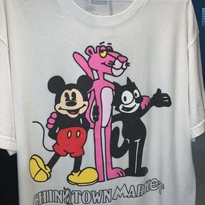 T Shirt / longer than typical on bottom. Rare